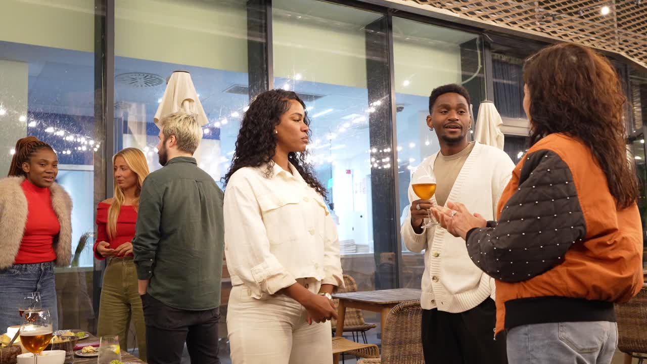 People enjoying a social gathering at a restaurant