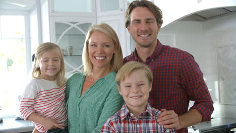 portrait of family in modern kitchen, slow motion