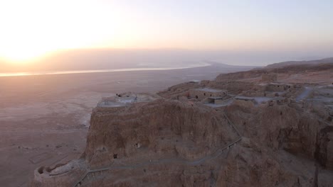 aerial drone tracking shot, circling the fortress of masada