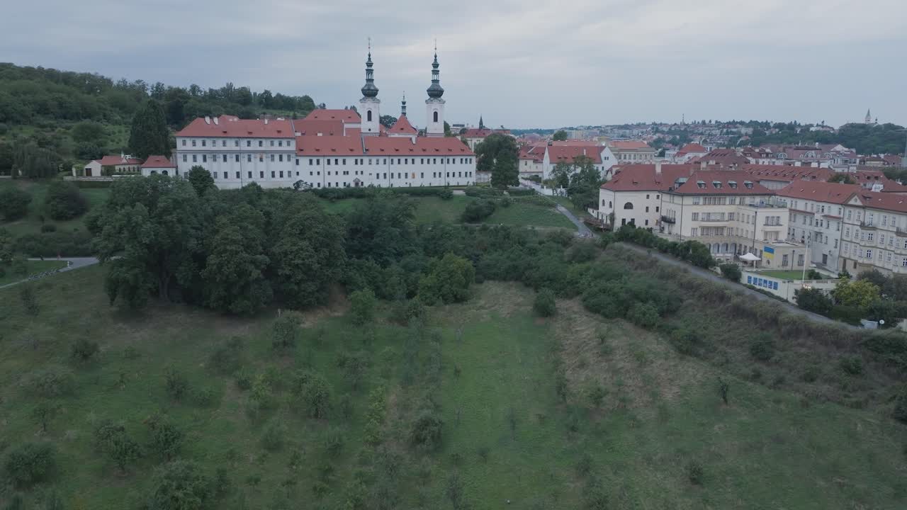 Aerial Drone Shot Prague Czech Republic Strahovsky Klaster Mala Strana Cloudy at Sunset