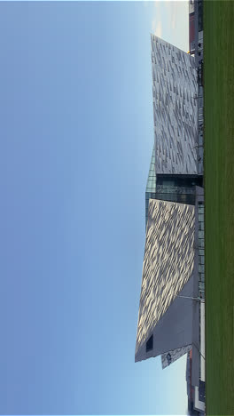 vertical shot of belfast’s iconic titanic museum and its striking design