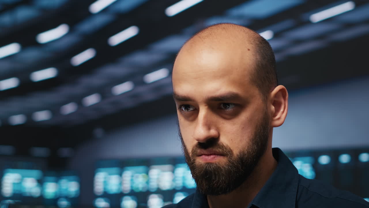 Close up shot of IT engineer safeguarding supercomputers against threats
