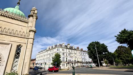 royal pavilion with passing red vehicle