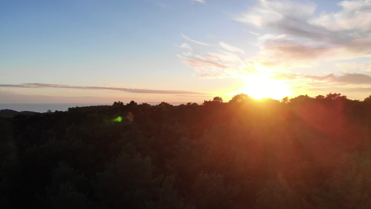 Aerial View Of Vibrant sunset over Mutters Moor in Devon, capturing a serene golden hour moment.