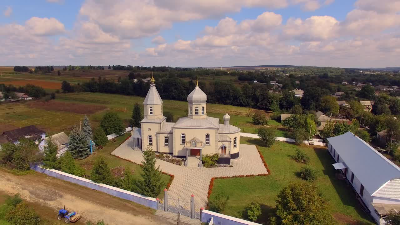 Orthodox church in the Ukrainian village. Aerial view 05