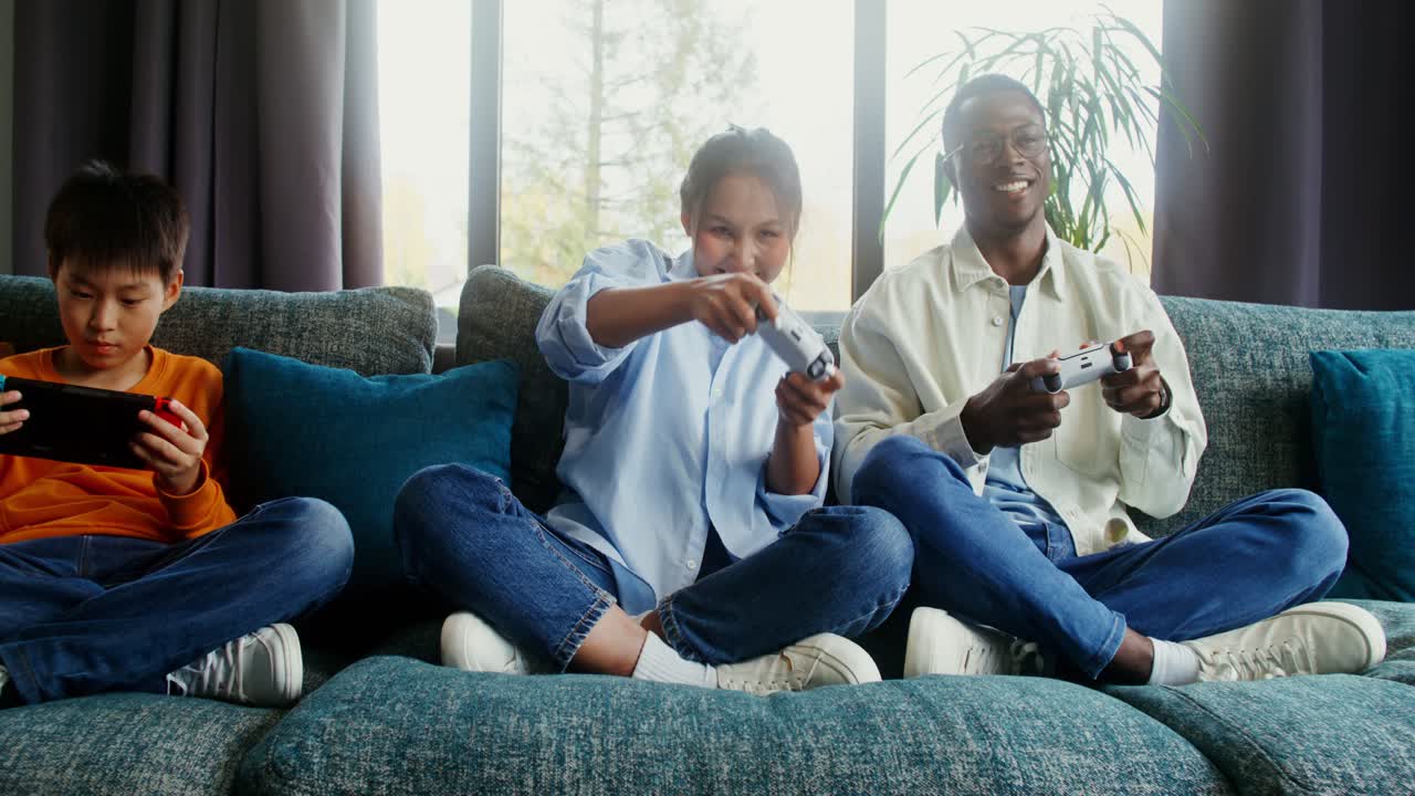 Family Playing Video Games Together at Home