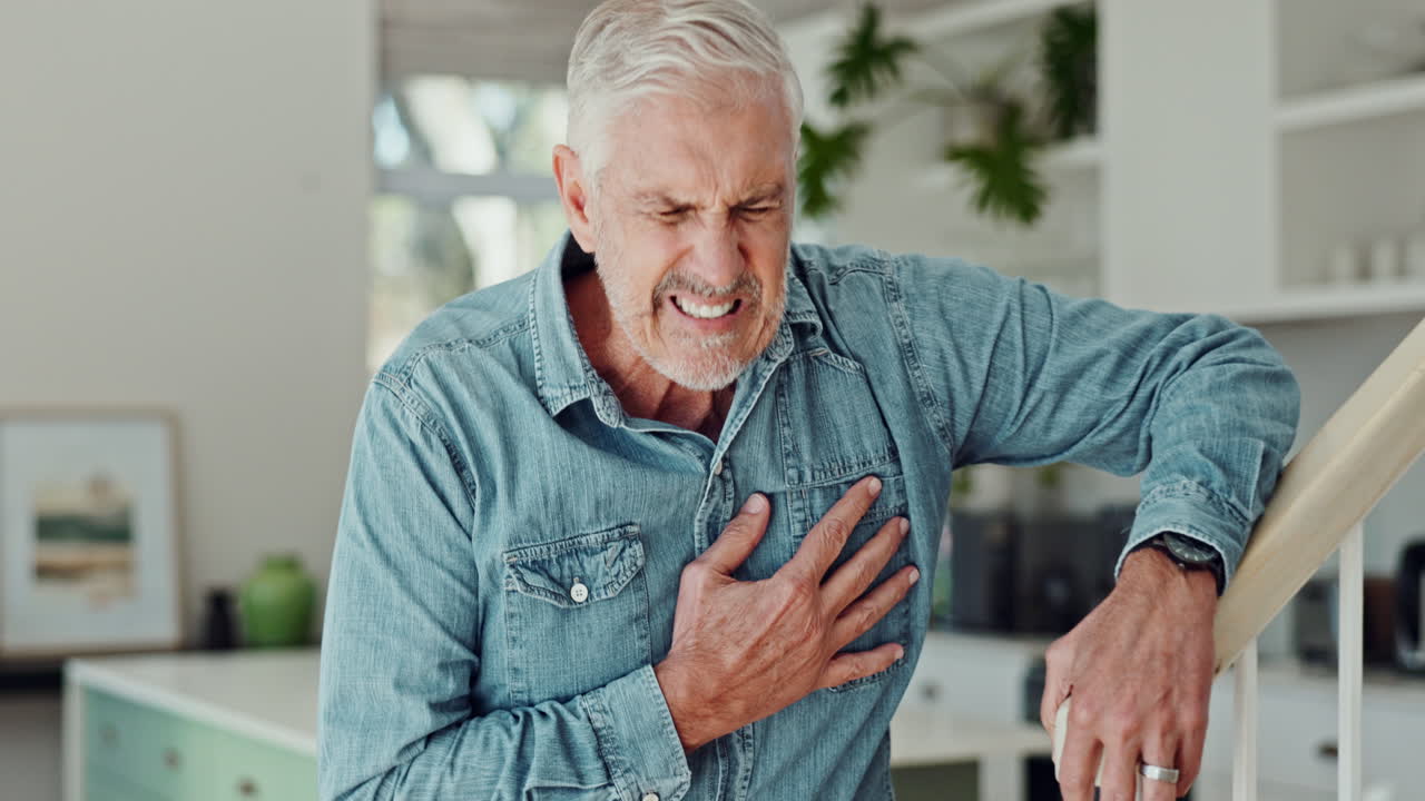 Older man experiencing chest pain