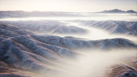 mountain landscape with deep fog at morning