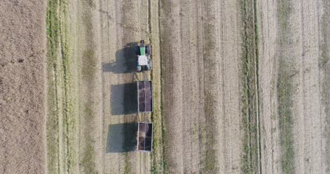 Machinery-Harvesting-Crops-On-Field-18