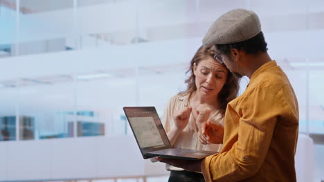 realtor broker and clients negotiating leasing contract on an office tour