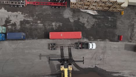 aerial top down timelapse of container ship loading and unloading view of business logistic import and export freight transportation by container