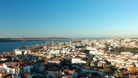 aerial view of the city of lisbon with the famous bridge ponte 25 de abril and cristo rei in the background, lisbon, portugal