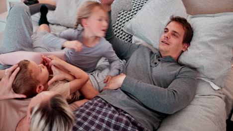 happy family, playing and kiss on bed with love