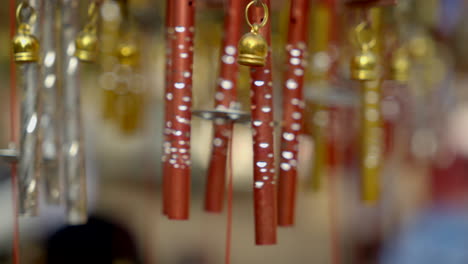 close-up wind chimes hangs on the porch of the house