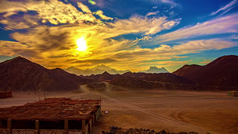 bedouin settlement in egypt in the rugged mountains near hurghada - sunset time lapse