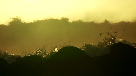 Large-waves-as-they-crest-and-break-in-slow-motion-at-sunset-4