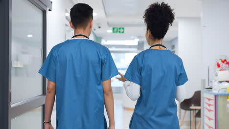 doctors, man and woman in hallway