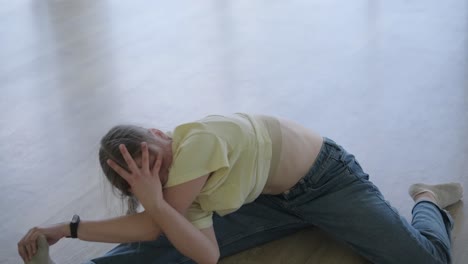 young girl breakdancing in modern studio