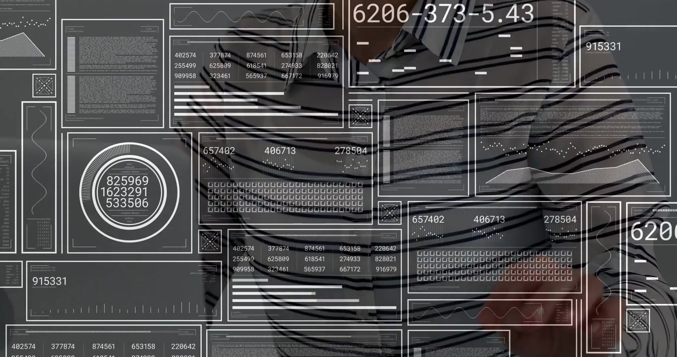 Technology user scanning HUD data for analysis typing on laptop tapping smartphone, reaching glass