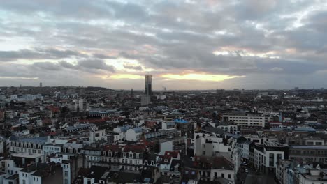 aerial panaromic pan from left to right view flight of brussels city on cloudy day, belgium