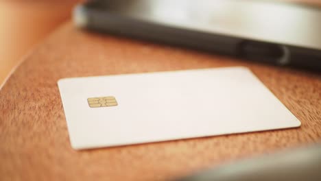credit card on a wooden table