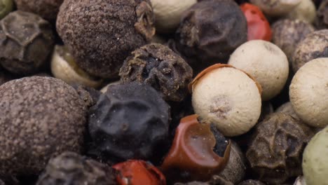 Macro-close-up-Mixed-peppercorns.-Dry-mix-peppercorns-close-up