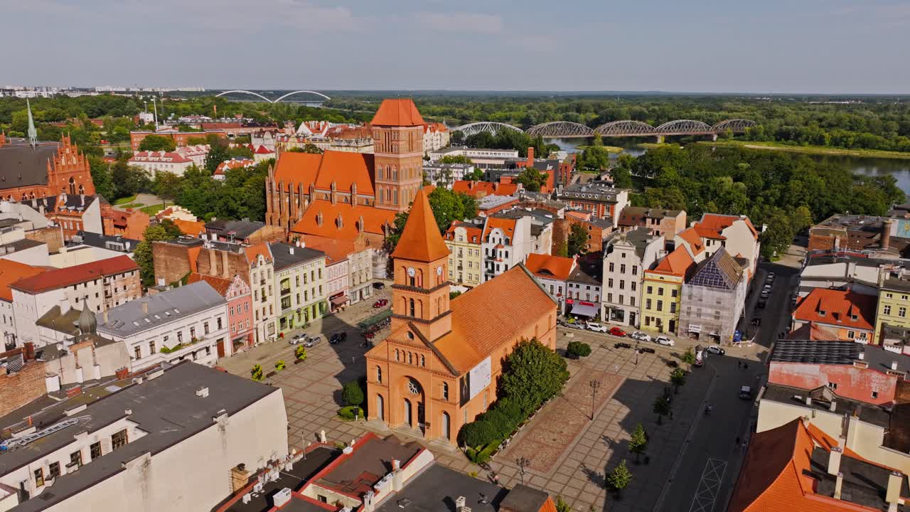 Drone panorama of Torun Poland blends historic churches with modern city layout