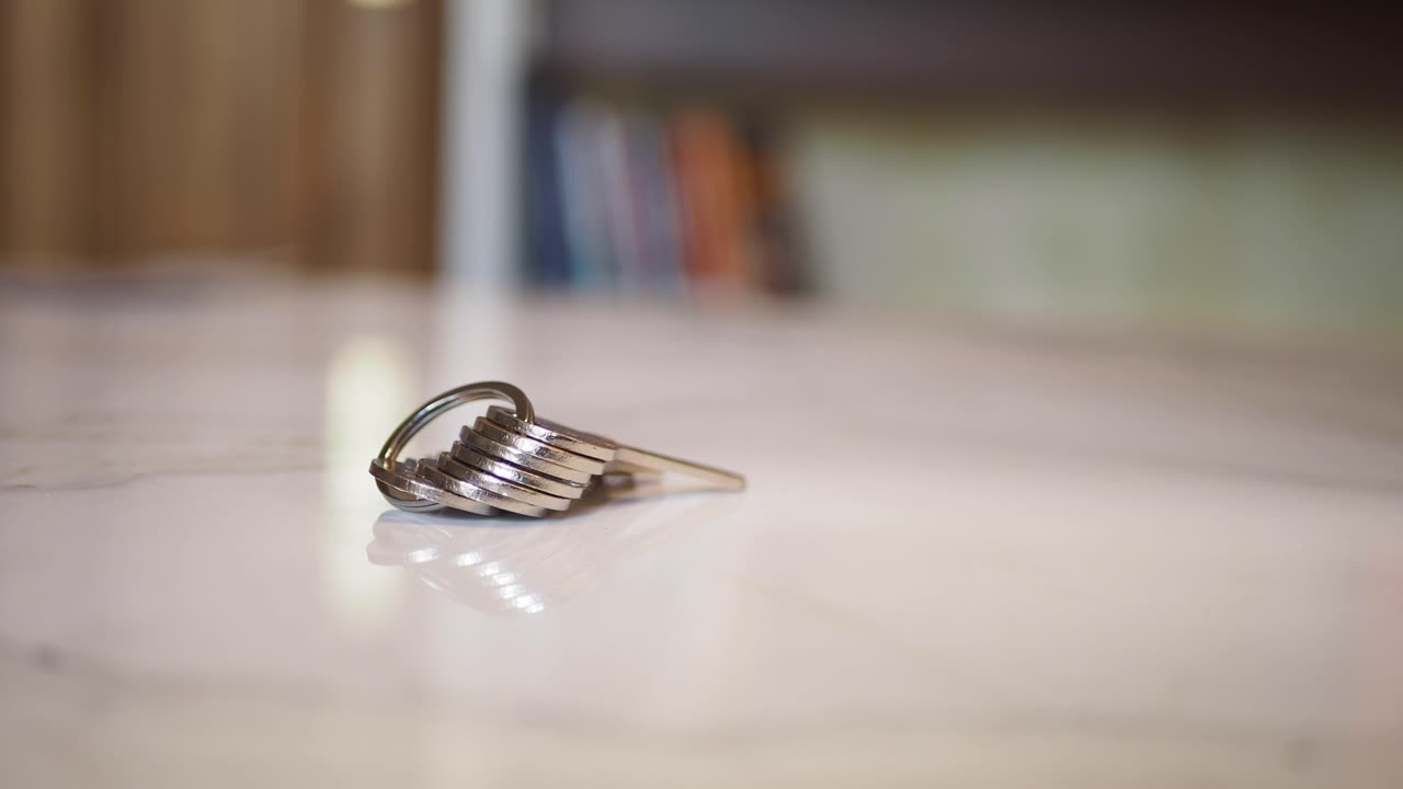 A bunch of keys on a white surface