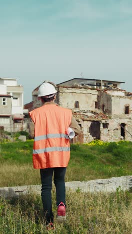 engineer walking on an high spot to watch the construction site from above