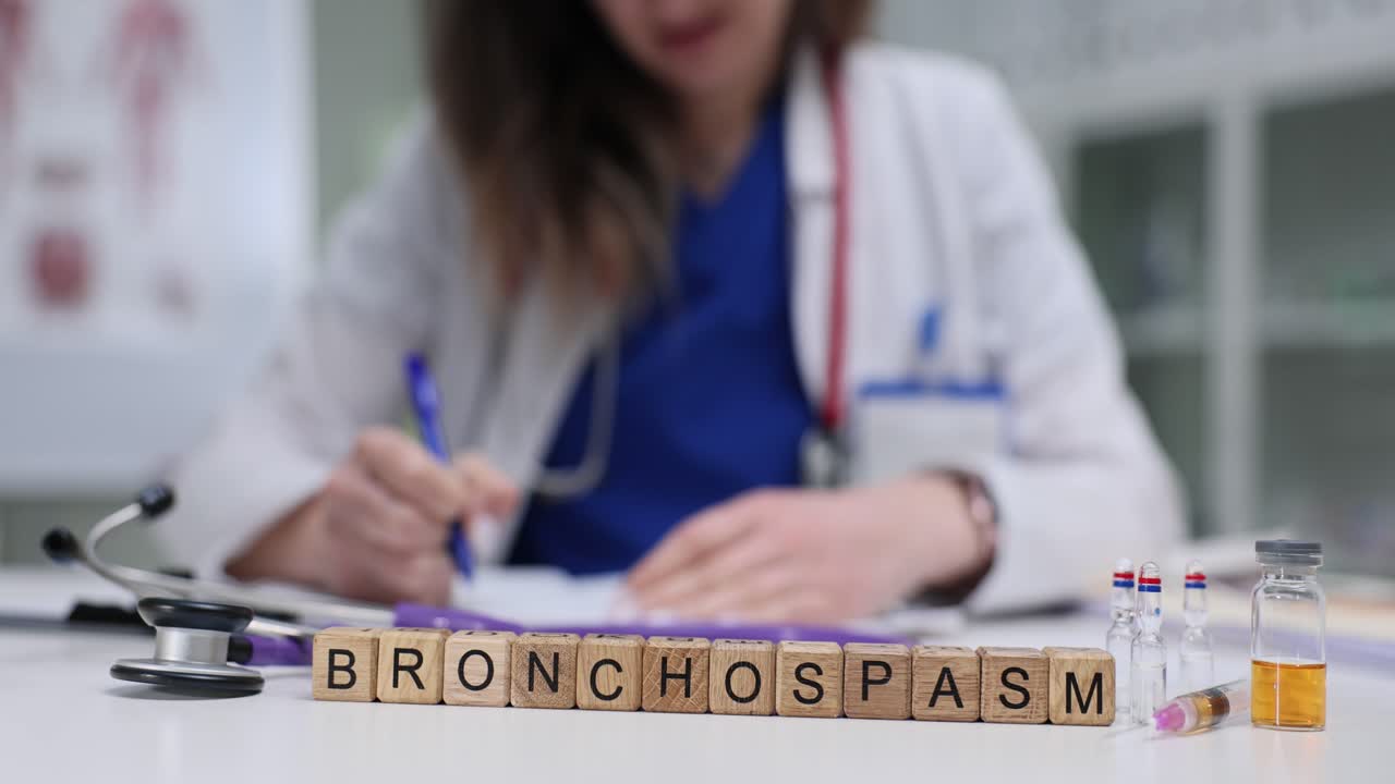 Medical professional with bronchospasm diagnosis on wooden blocks