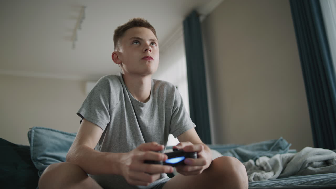 Teenage Boy Playing Video Games