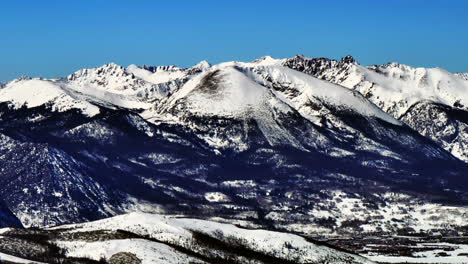 frisco silverthorne breckenridge tenmile peak colorado aerial drone red buffalo rocky mountains landscape winter sunny clear morning blue sky fresh snow circle right movement