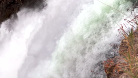 up close mist upper lower falls waterfalls grand canyon of the yellowstone national park river hdr lookout artist point autumn canyon village stunning afternoon landscape cinematic still slow motion