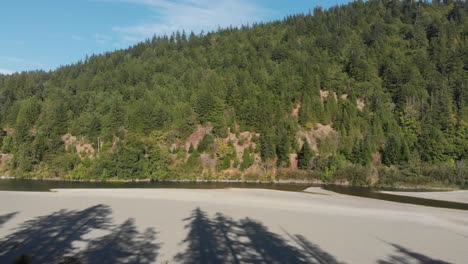 Rising-aerial-view-of-the-South-Fork-Eel-river-in-Humboldt-County,-California