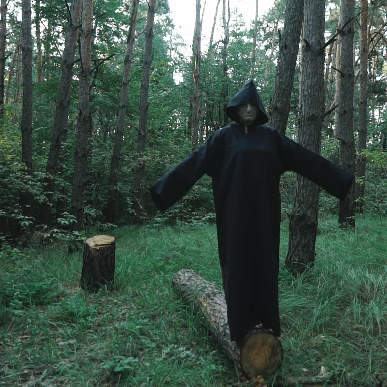 Ghost in the woods. Horror scene of a scary ghost. Mysticism of Halloween