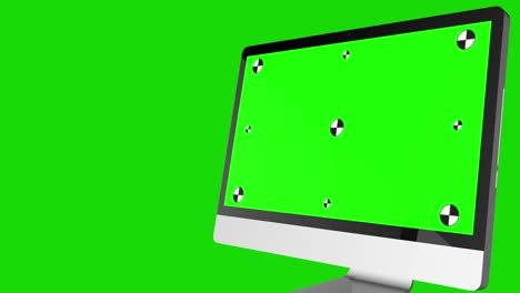 laptop or desktop computer with green screen and calibration pattern