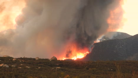 static view of flames and thick smoke at fairview wildfire, california