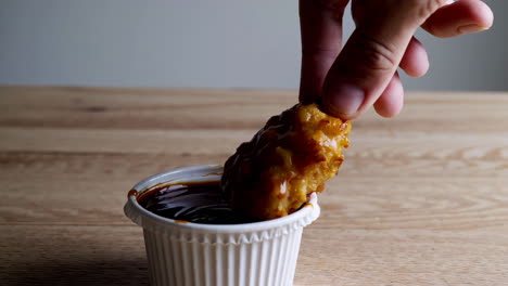 dipping fried chicken