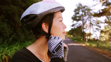 female mountain biker wearing glove