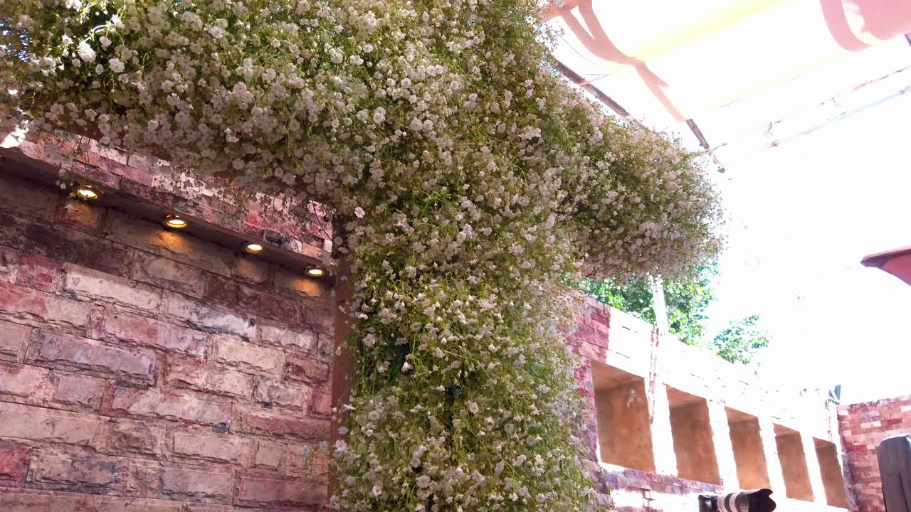 religious cross made with beautiful plants and flowers