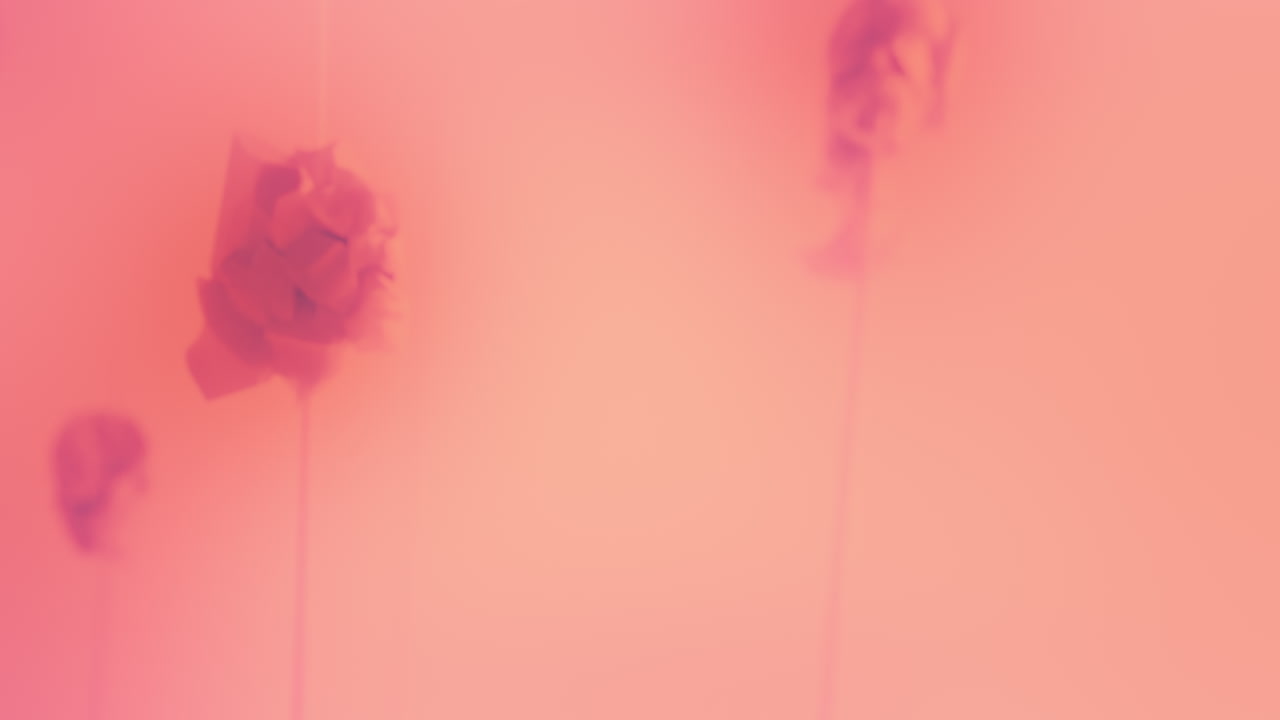 Destroyed android heads on spikes on the neon pink background