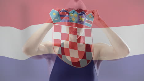 animación de la bandera de croacia sobre una nadadora caucásica