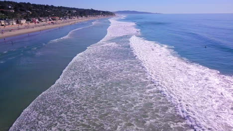 aerial footage along a pacific shore in southern california