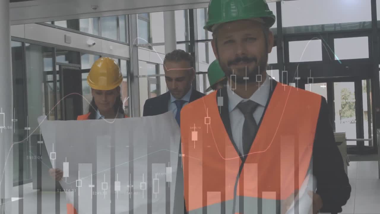 arquitectos que estudian los planos de los edificios