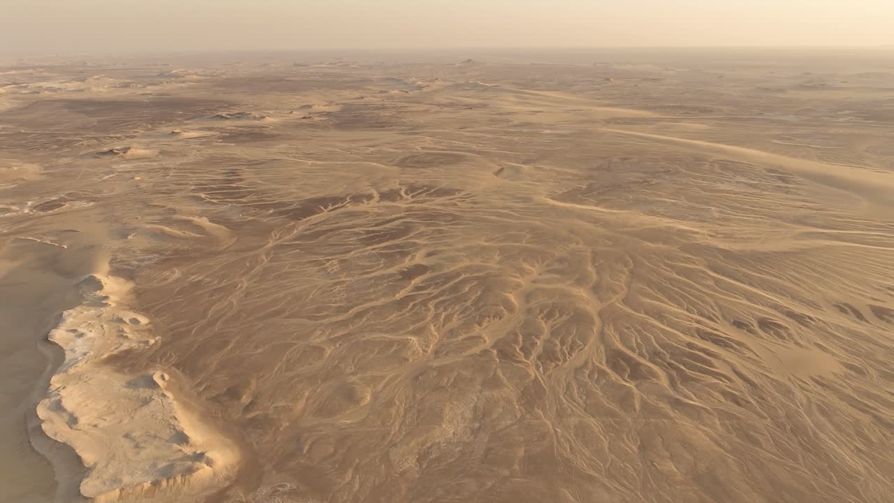 Aerial View of a Desert Landscape with Erosion Patterns