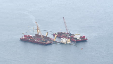 marine salvage vessel for sunken ship bulk carrier os 35 wreck at sea