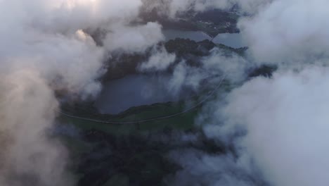 side panning drone shot of lagoa das sete cidades during sunset, aerial