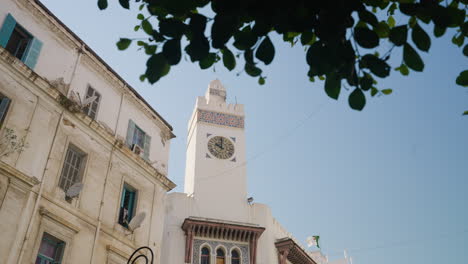 Algerian-Traditional-Architecture-With-The-Clock-Tower-Of-Modern-Arts-Museum-In-Algiers,-Algeria