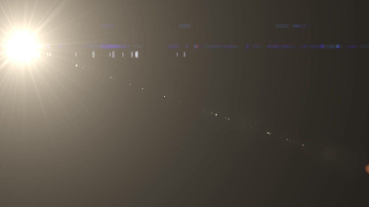 검은색 배경에 햇빛 렌즈 플레어 효과
