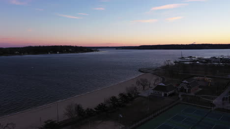 an-aerial-shot-over-an-empty-park-during-a-beautiful-sunrise